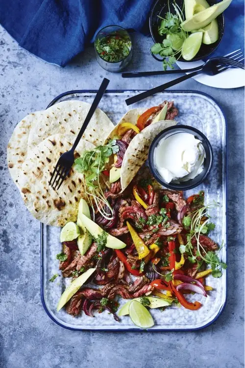 Skirt Steak Fajitas with Chimichurri, recipe by Hayden Quinn