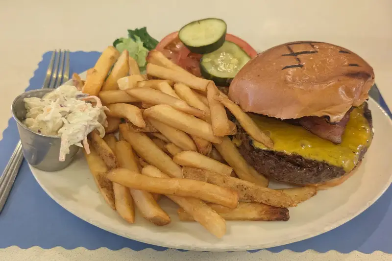 Cheeseburger with fries on a diner plate